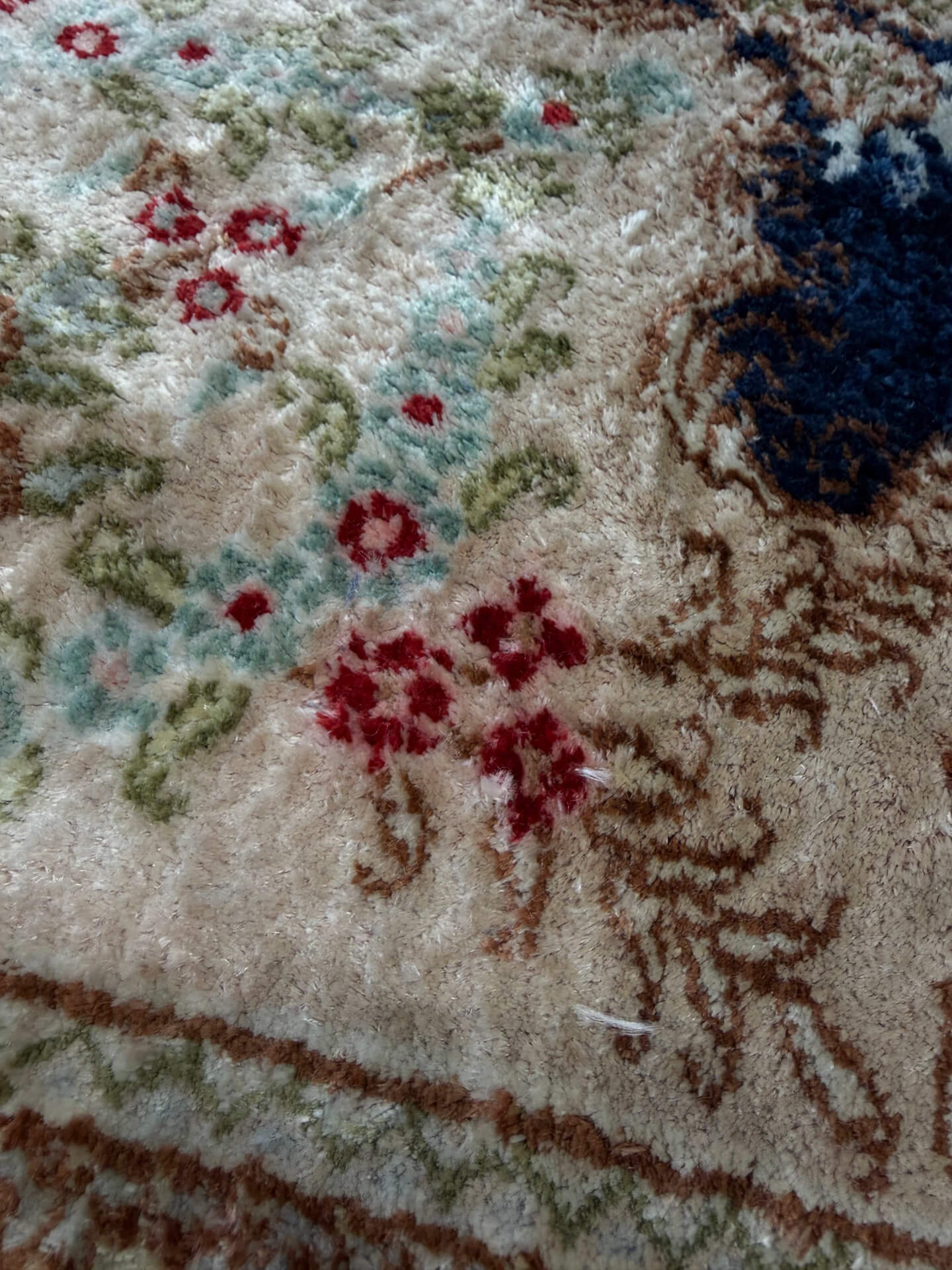 Silk rug cleaned damaged by another rug cleaner